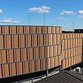Parkhaus für die DIVAG LO7 Projektentwicklungsgesellschaft in Monheim gebaut von Schreiber Stahlbau Ansicht bunte Fassade